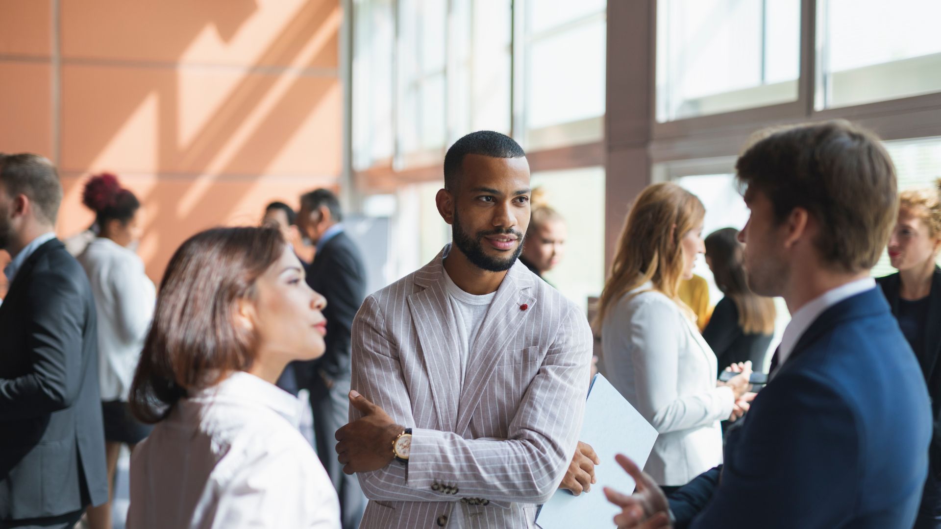 Networking conversation between conference attendees