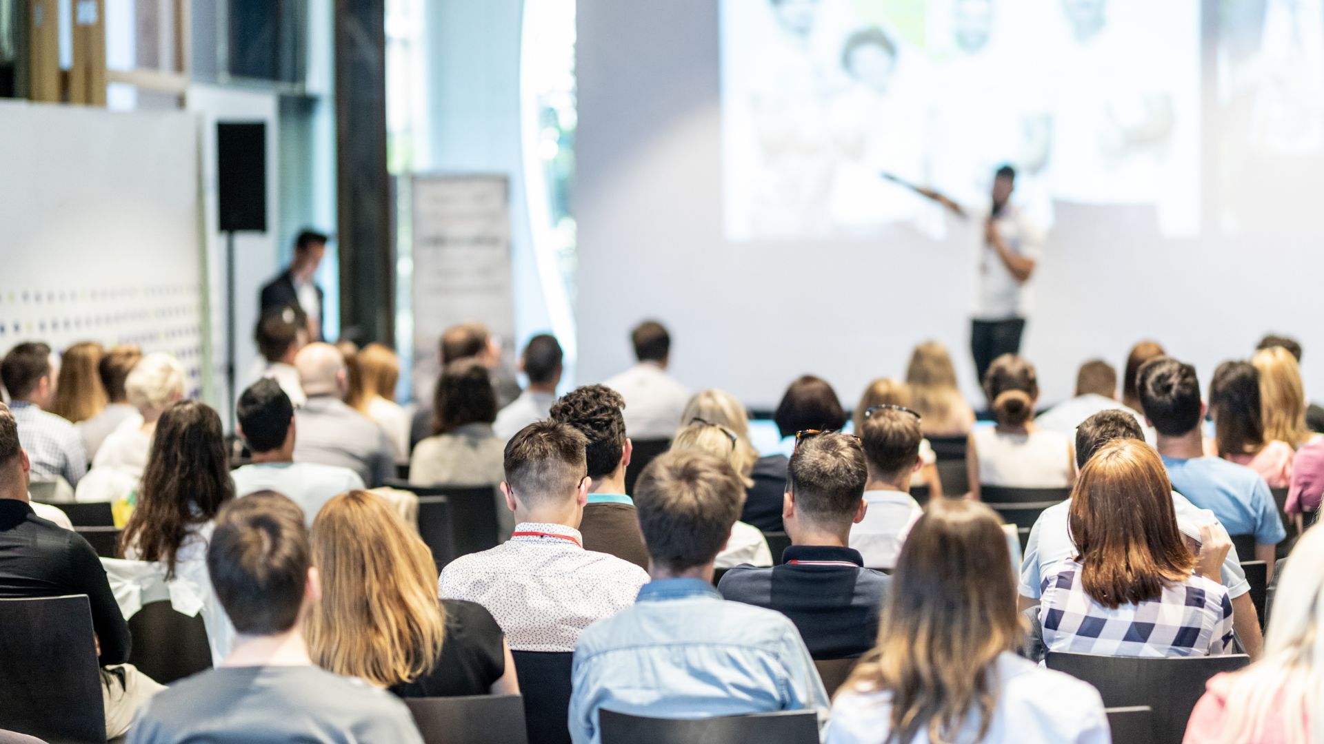 Conference audience facing the stage